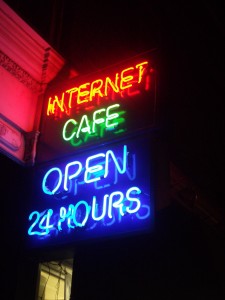 Neon_Internet_Cafe_open_24_hours Neon Internet Cafe open 24 hours 225x300 Communicate on the Cheap: How to Save on Phone and Internet Communication While Traveling